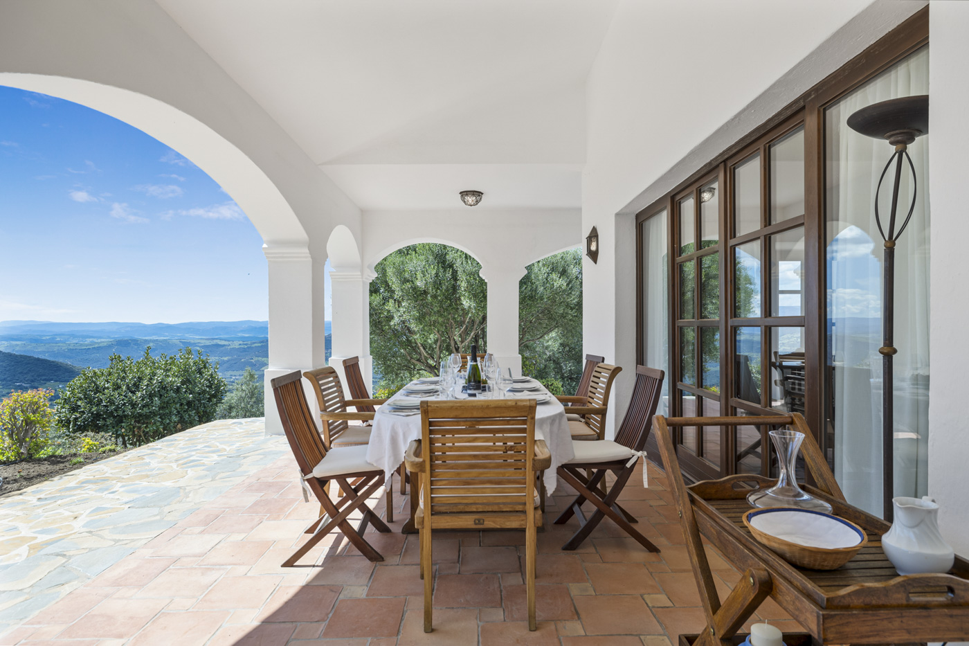 Furnished porch next to main living room. Amazing views.